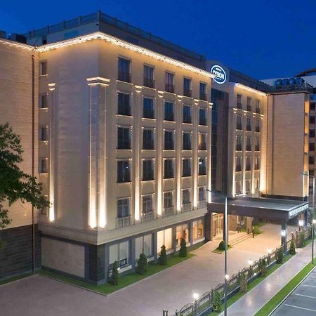 Orion Hotel Bishkek Bagian luar foto Hilton Prague
