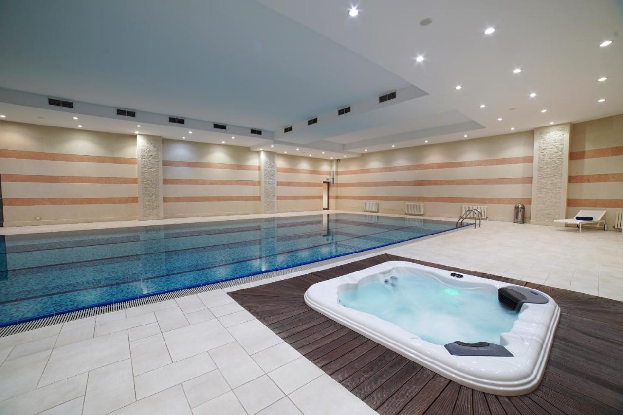 Orion Hotel Bishkek Bagian luar foto A spa