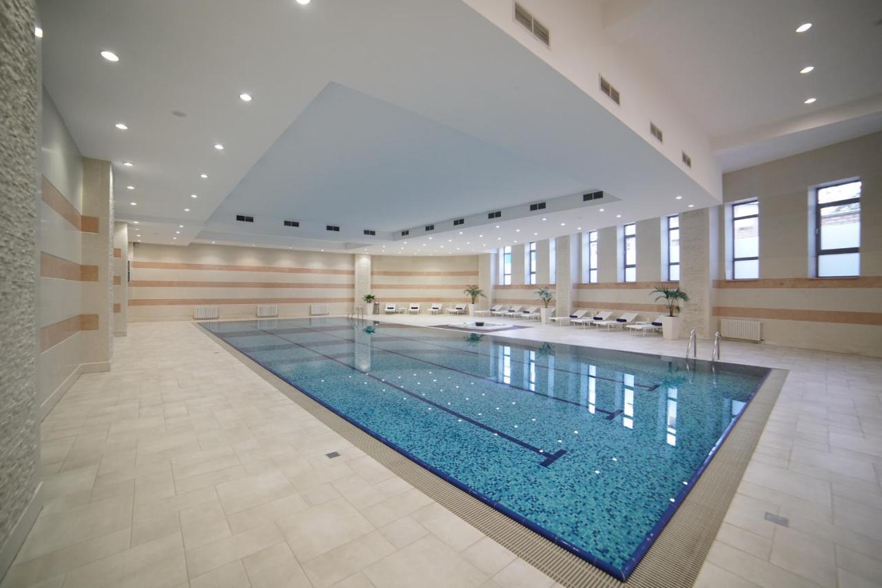 Orion Hotel Bishkek Bagian luar foto Swimming pool