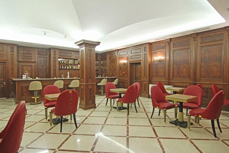 Orion Hotel Bishkek Bagian luar foto The interior of the bar