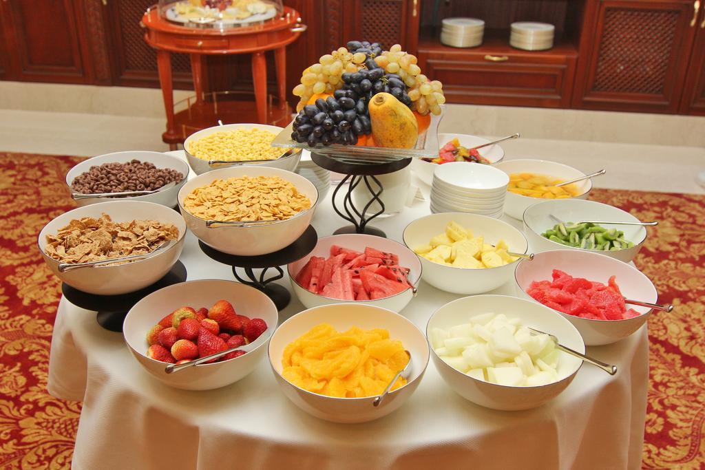 Orion Hotel Bishkek Bagian luar foto Fruit salad