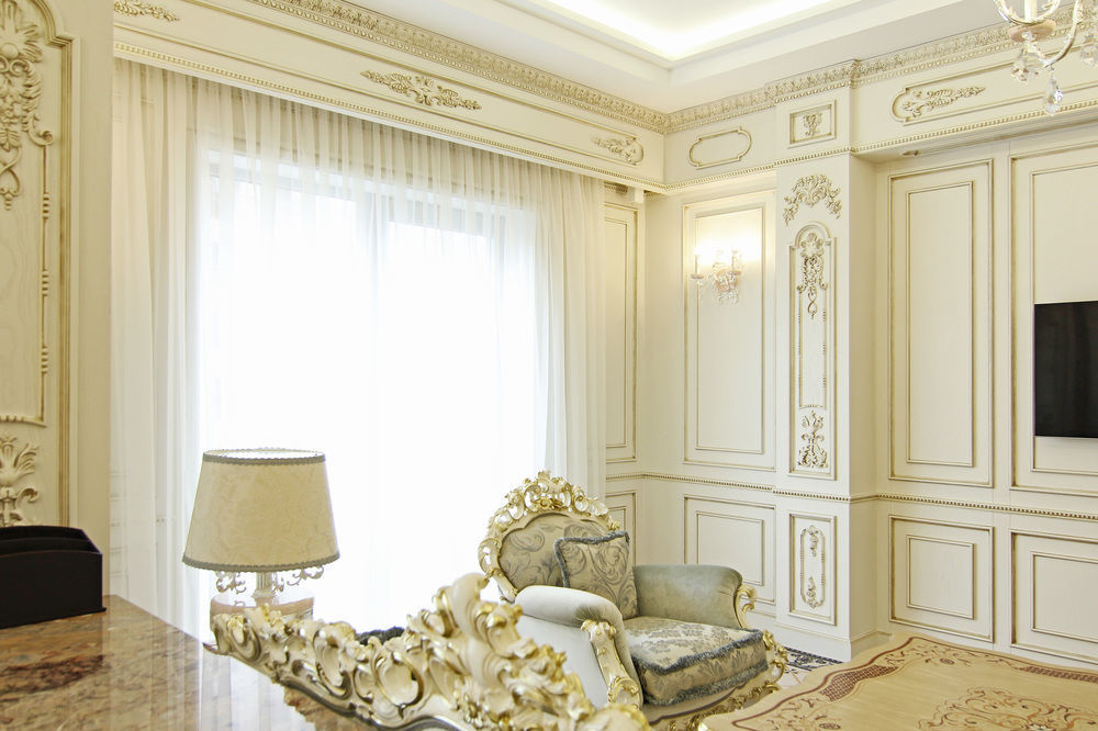 Orion Hotel Bishkek Bagian luar foto A room with a curtain
