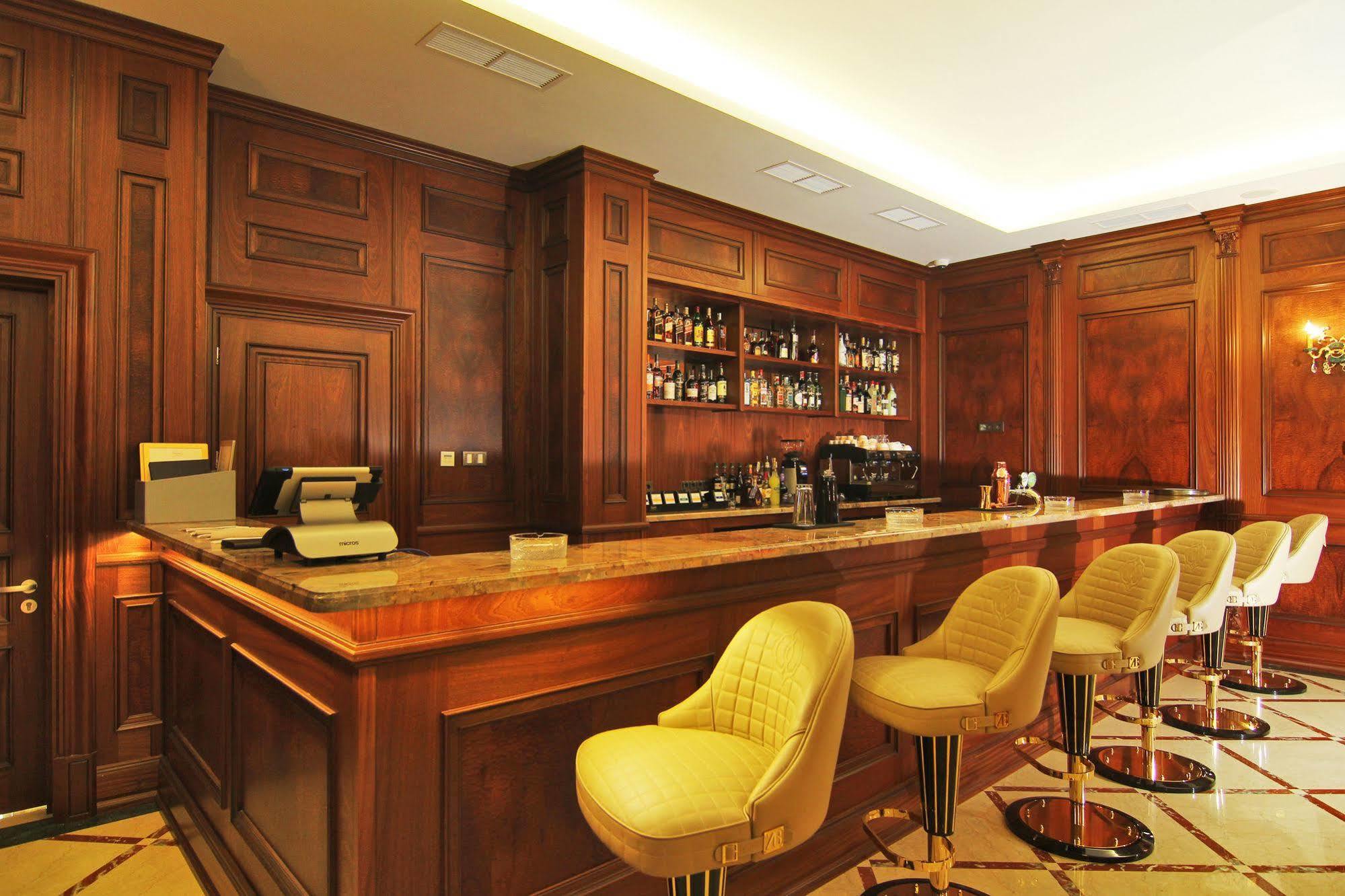 Orion Hotel Bishkek Bagian luar foto The bar at the St. Regis